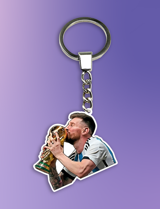 Messi with the World Cup Keychain
